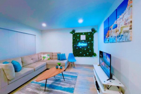 Modern Santorini Suite Houston NRG TMC Luxurious Walkable